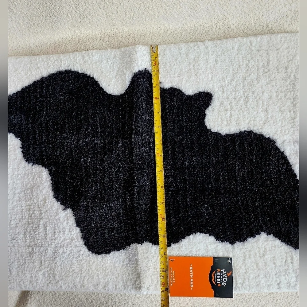 New Hyde and eek Halloween cream color Bath Rug with a black bat print
